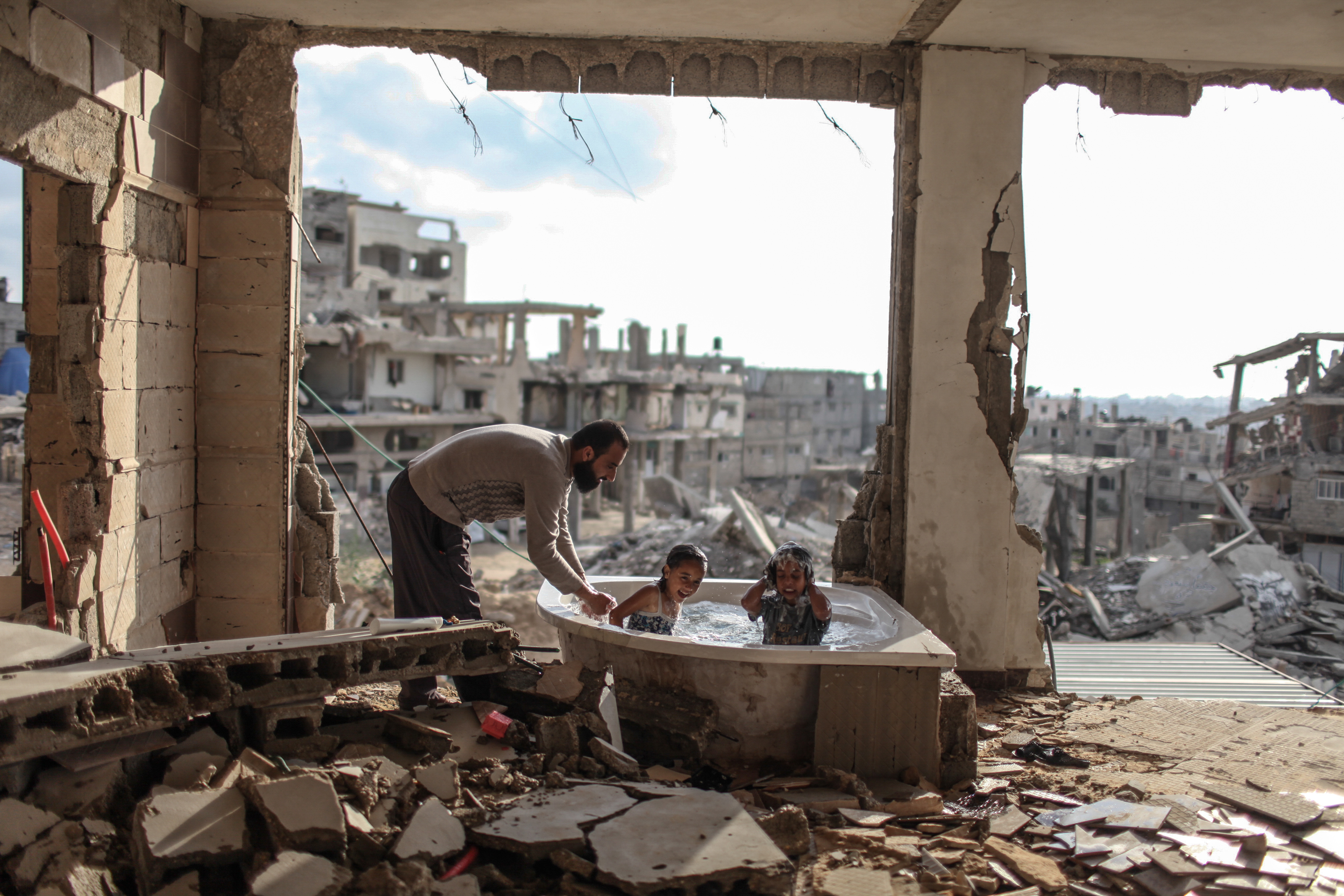 Cover Photo by Emad Nassar titled : Gaza Bath time